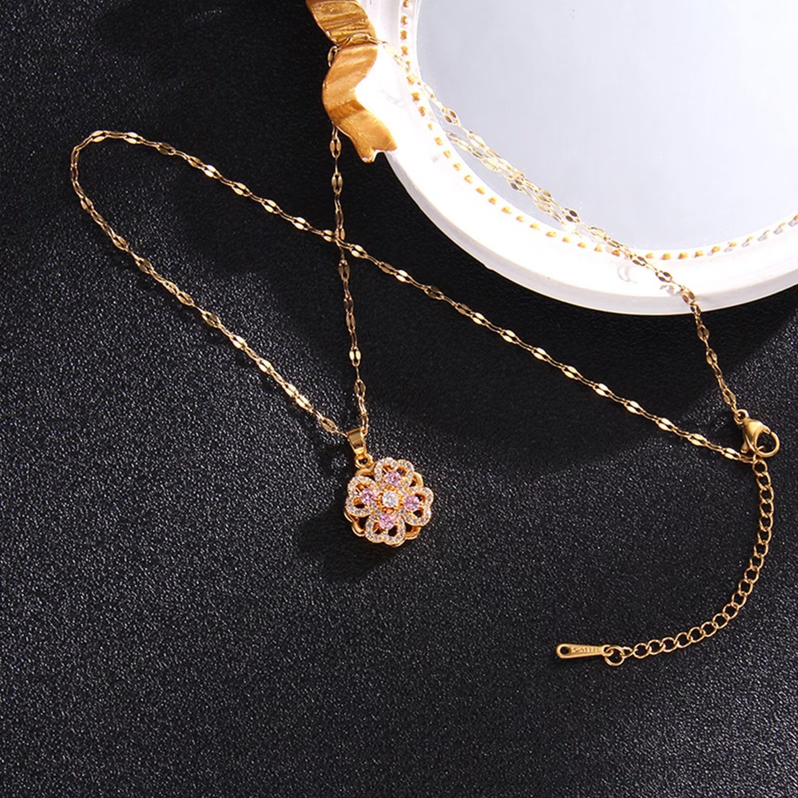 Presentski Rotating Sparkling Hollow Flower Pendant Spinner Necklace TSN008